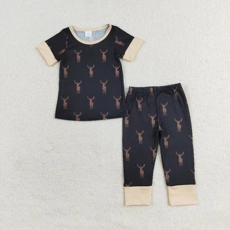 Soft, breathable deer print pajamas for toddlers and kids. This black bamboo-blend sleep set is perfect for year-round comfort and sensitive skin.